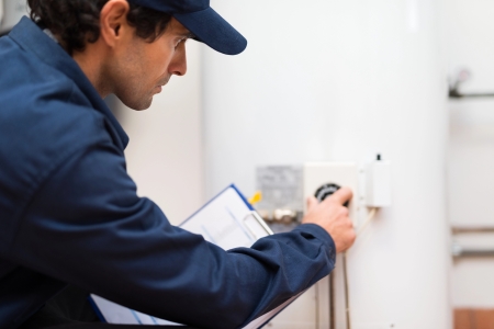 Licensed plumber inspecting upstate south carolina water heater